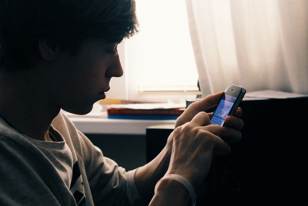 boy texting